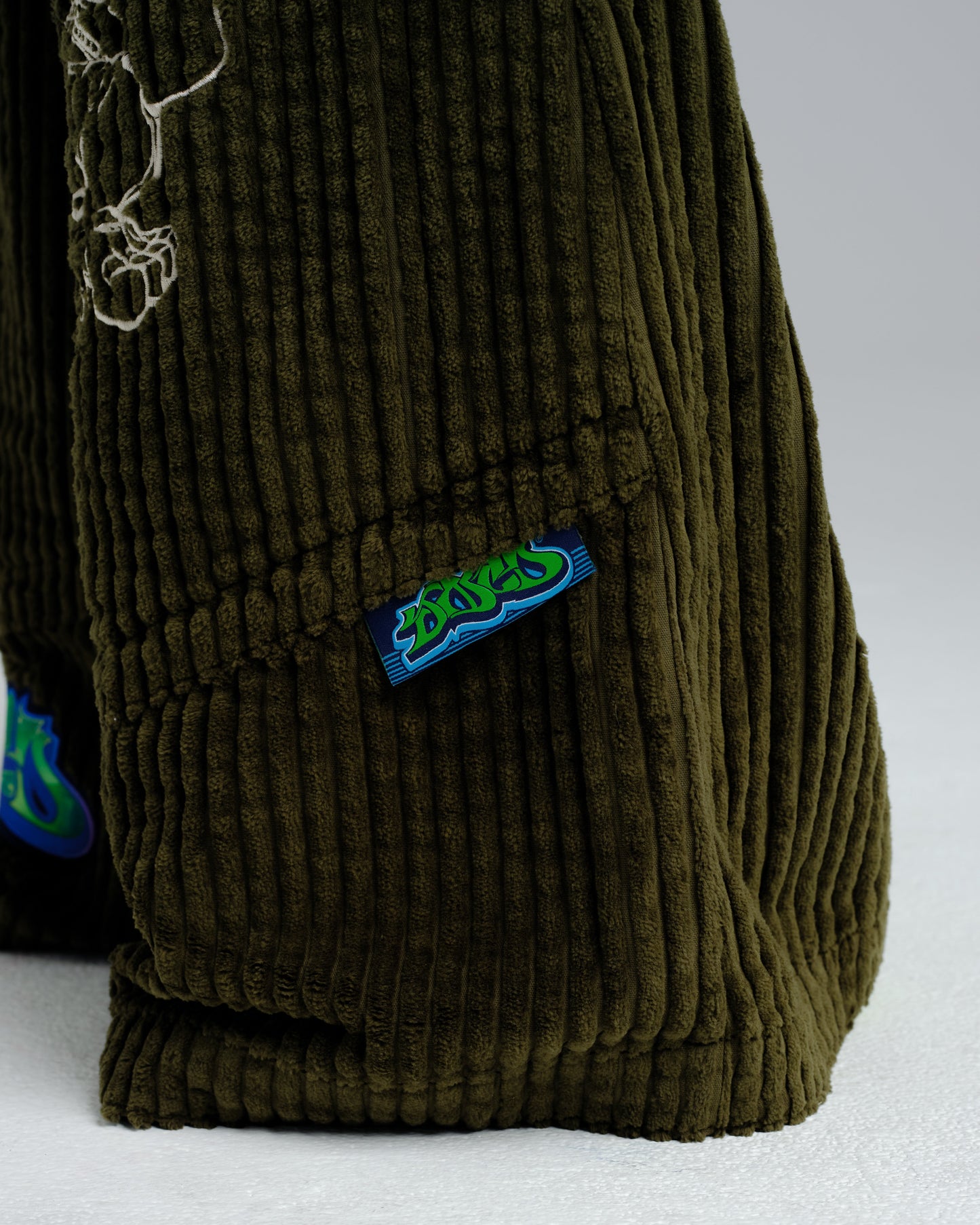 Hangin'. 34". 2 Wale Corduroy. Moss.