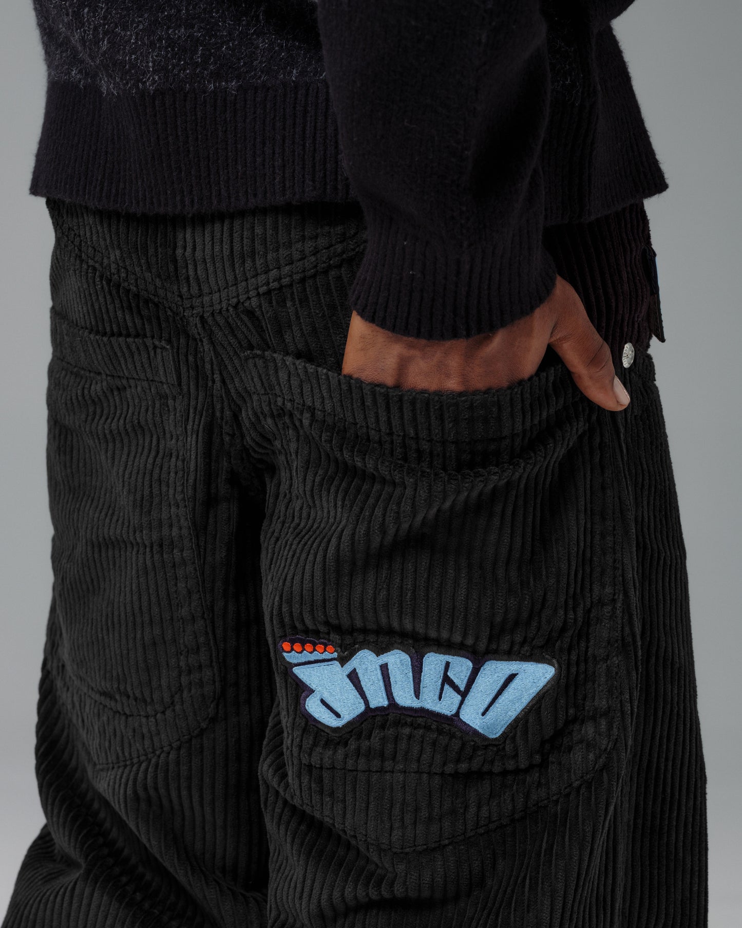 169 Low Down. 20". 4 Wale Corduroy. Black.